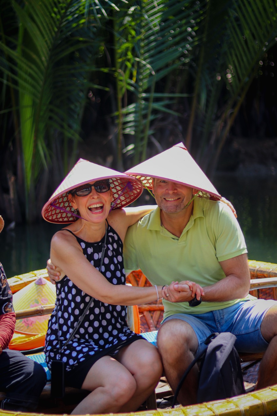 Happy guests on basket boat at Cocolocal Farm, Hội An